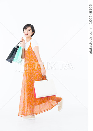 Young woman shopping on white background Young woman shopping on white background 106546106