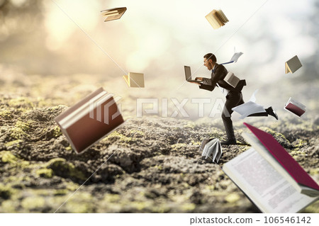 Businessman running among chaos . Mixed media Businessman running among chaos . Mixed media 106546142