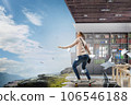 Young woman riding her skateboard 106546188