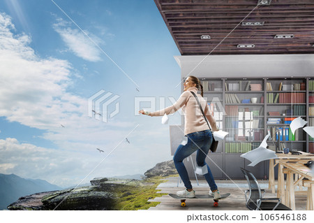 Young woman riding her skateboard Young woman riding her skateboard 106546188