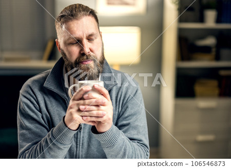 Man relaxing at home Man relaxing at home 106546873