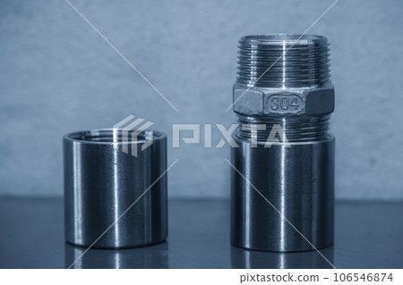 Close up scene the set of pipe connector parts made from stainless steel 304 grade . Close up scene the set of pipe connector parts made from stainless steel 304 grade . 106546874
