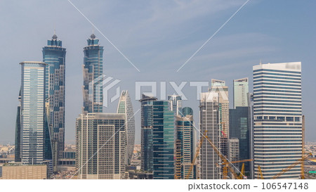 Cityscape with skyscrapers of Dubai Business Bay and water canal aerial timelapse. Cityscape with skyscrapers of Dubai Business Bay and water canal aerial timelapse. 106547148