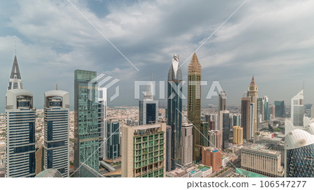 Skyline panoramic view of the high-rise buildings on Sheikh Zayed Road in Dubai aerial timelapse, UAE. Skyline panoramic view of the high-rise buildings on Sheikh Zayed Road in Dubai aerial timelapse, UAE. 106547277