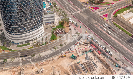 Aerial view construction site with a foundation pit of new skyscraper timelapse. Aerial view construction site with a foundation pit of new skyscraper timelapse. 106547299