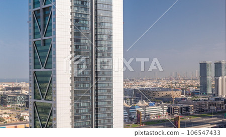 Aerial panoranic view to Dubai City Walk district behind skyscraper timelapse from above 106547433