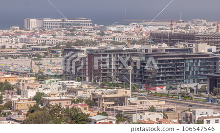 Aerial view to Dubai City Walk district timelapse from above Aerial view to Dubai City Walk district timelapse from above 106547546