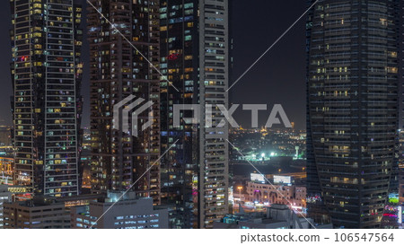 Business bay district skyline with modern architecture night timelapse from above. 106547564
