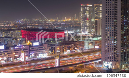 Aerial view to Dubai City Walk district night timelapse from above 106547588