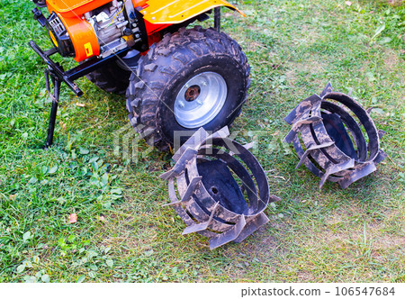 lugs complete with walk-behind tractor instead of wheels for better cross-country ability of the motor cultivator 106547684