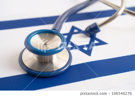 Stethoscope on Israel flag background, Business and finance concept. Stethoscope on Israel flag background, Business and finance concept. 106548276
