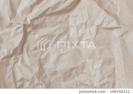 Rumpled Kraft paper texture background close-up Rumpled Kraft paper texture background close-up 106548322