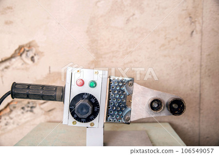 machine for welding polypropylene pipes in plumbing. Copy space for text 106549057