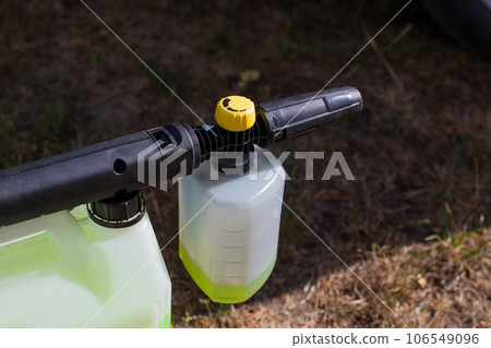High pressure washer with foam nozzle for cleaning the car with foam. Modern concentrated shampoo. 106549096