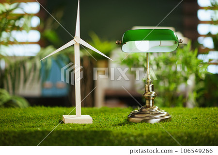 grass desk in modern green office with windmill and lamp grass desk in modern green office with windmill and lamp 106549266