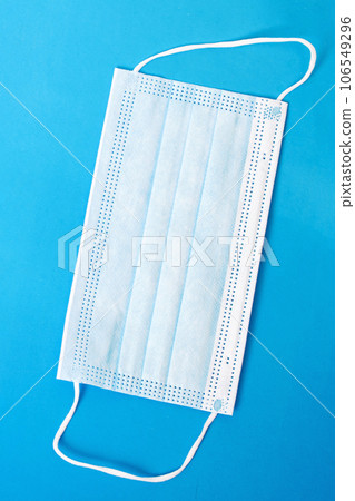 Medical mask on blue background copy space Medical mask on blue background copy space 106549296