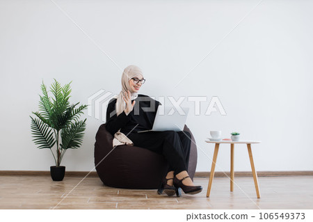 Female starting online meeting via computer in workplace Female starting online meeting via computer in workplace 106549373