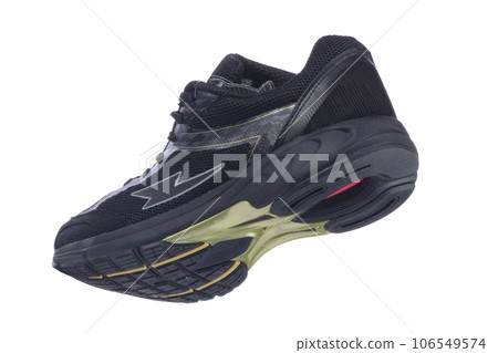 Black beautiful sneaker with gold inserts on a white background. 106549574