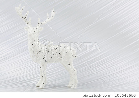 On a silver background, a white Christmas deer. On a silver background, a white Christmas deer. 106549696