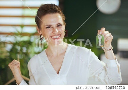 happy young 40 years old woman realtor in modern green office 106549720