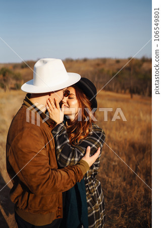 Lovely hipster couple enjoying each other in the autumn park. Nice autumn day. love and lifestyle. 106549801