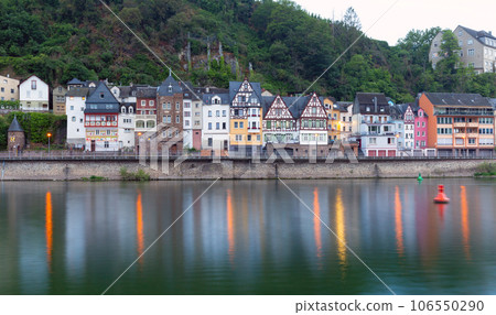City embankment along the banks of the Moselle River in Cochem. 106550290