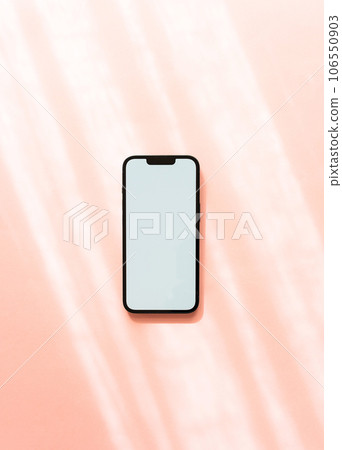 White blank path screen mobile phone with mockup on neutral pink background with shadows. White blank path screen mobile phone with mockup on neutral pink background with shadows. 106550903