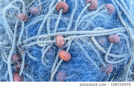 Close up view of fishing net. Close up view of fishing net. 106550970