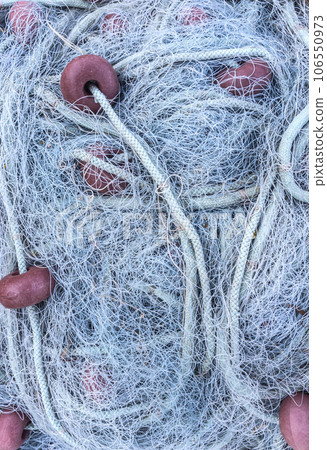 Close up view of fishing net. Close up view of fishing net. 106550973