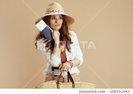 sad trendy woman in white blouse and shorts on beige background sad trendy woman in white blouse and shorts on beige background 106551043