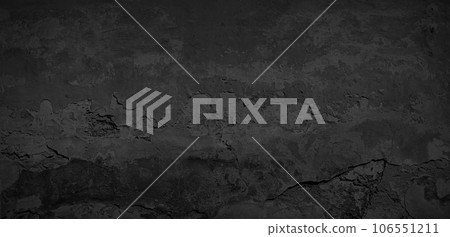 Texture of an old black brick wall Texture of an old black brick wall 106551211