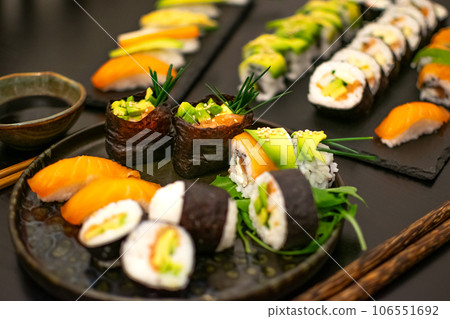 Luxurious and creative Sushi as Nigiri,Futomaki,Uramaki with chopsticks and Soja 106551692
