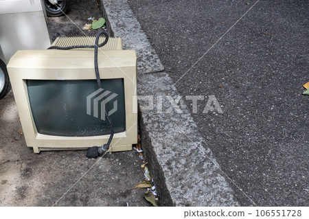 Monitor thrown in Street as Contamination and Recycling of Electronic Components 106551728