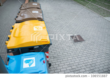 Recycling bins for plastic, cardboard and organic in their colors for public use Recycling bins for plastic, cardboard and organic in their colors for public use 106551887