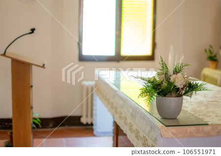 Altar of church with lectern and microphone for priest speeches with clear light 106551971