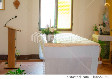 Altar of church with lectern and microphone for priest speeches with clear light 106551980