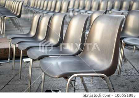 Set of Chairs unfolded for events like congress, meeting, conference or marriage 106551995