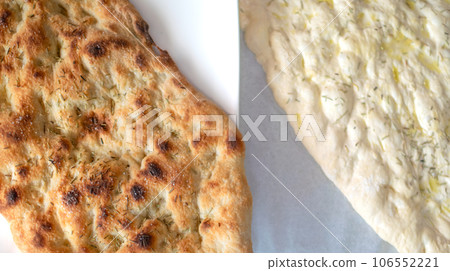 Two typical Italian Focaccia masses, one cooked and other white levitated together Two typical Italian Focaccia masses, one cooked and other white levitated together 106552221