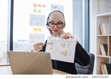 Employee decoding charts on online briefing using devices Employee decoding charts on online briefing using devices 106553185