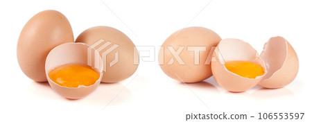 two whole eggs and broken egg isolated on white background two whole eggs and broken egg isolated on white background 106553597