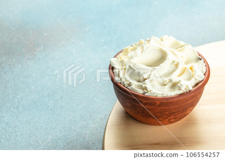 Bowl of cream cheese. Concept healthy and balanced eating. place for text, top view 106554257