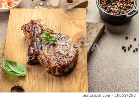 Appetizing grilled pork. Healthy food concept. place for text, top view Appetizing grilled pork. Healthy food concept. place for text, top view 106554298
