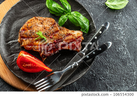 Grilled pork loin steak. banner, menu, recipe place for text, top view Grilled pork loin steak. banner, menu, recipe place for text, top view 106554300