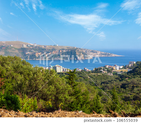 Summer coast view and town on shore (Albania) Summer coast view and town on shore (Albania) 106555039