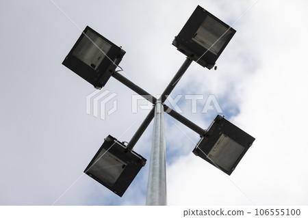 Bottom view of four lighting tubes used on city streets. 106555100
