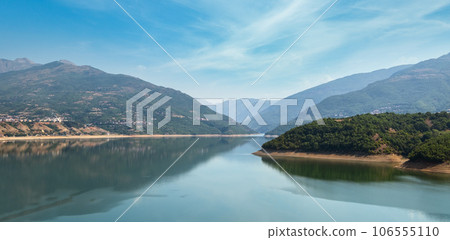 Debar lake summer countryside landscape with mountains background. North Macedonia not far from Debar Town, Europe. Debar lake summer countryside landscape with mountains background. North Macedonia not far from Debar Town, Europe. 106555110