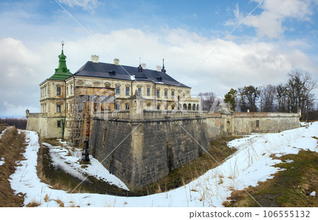 Spring panorama view of old Pidhirtsi Castle (Ukraine, Lvivska Region, built in 1635-1640 by order of Polish Hetman Stanislaw Koniecpolski). 106555132