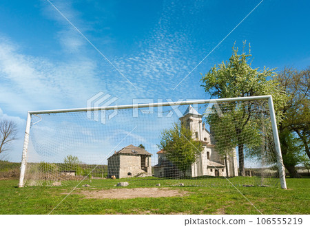 Old church and football goal (Sydoriv village, Ternopil region, Ukraine) 106555219