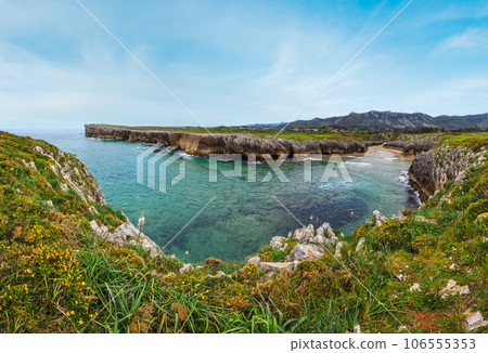 Guadamia beach (or Aguamia) rocky coast summer scenery. Asturias, Spain. Guadamia beach (or Aguamia) rocky coast summer scenery. Asturias, Spain. 106555353