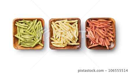 Fusilli pugliesi. Italian tricolor twisted pasta isolated on white background. 106555514